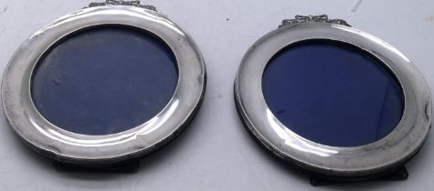 Pair of Birmingham Hallmarked circular decorative silver frames, 5inches dia