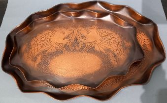 Two Art Nouveau period Cornish oval copper trays with Fish repoussé design, J & F Pool, 15.75"