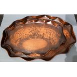 Two Art Nouveau period Cornish oval copper trays with Fish repoussé design, J & F Pool, 15.75"