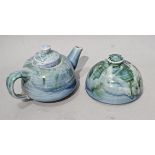 Lamorna Pottery, a Teapot and Butter / Cheese Cover on a blue / green ground, both marked with