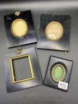Four Ebonised Miniature Frames