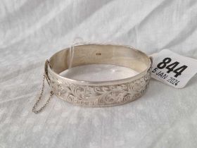A Hinged Silver Bracelet Engraved With Scrolls, Birmingham 1963, 35 G.