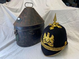 A Prussian Helmet In A Metal Box