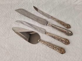 A Silver Handled Pie Slice, A Bread Knife Etc