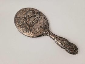 An Edwardian Hand Mirror, The Back Embossed With Cherubs Heads, Birmingham 1905