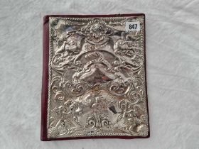 A Book Cover Embossed With Angels And Scrolls On A Leather Base, 11 Inches High, London 1985