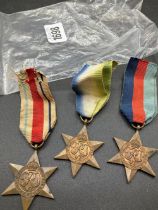 Three Wwii Star Medals & Another