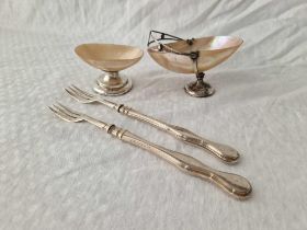 A Pair Of Silver Handled Pickle Fork And Two Mop Silver Mounted Pin Baskets
