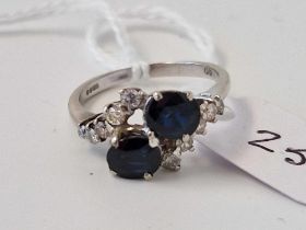 A White Gold Sapphire And Diamond Cross Over Ring 18Ct Gold Size N