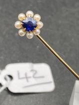 A Victorian Sapphire And Pearl Stick Pin In High Carat Gold