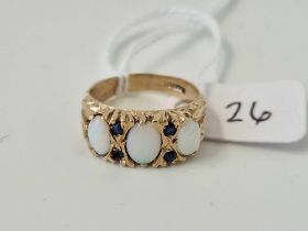 A Three Stone Opal Carved Half Hoop Ring With Sapphires Set Between The Opals 9Ct Size K