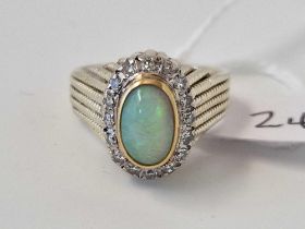 A 1960S Two Colour Gold High Carat Opal And Diamond Cluster Ring Size L