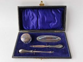 A dressing table set with nail buffer, jar etc, Birmingham 1921