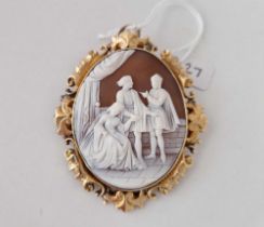 A ANTIQUE GOLD MOUNTED CAMEO BROOCH DEPICTING A CLASSICAL THEME 62MM X 73MM