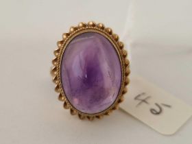 An amethyst cabochon ring, 9ct, size K 1.5, 5.1 g