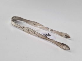 A pair of George III bright cut sugar tongs with acorn decoration, London 1795 by PB, AB