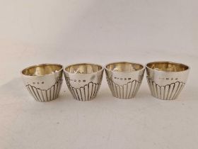 A set of four Victorian salts with half fluted bodies, 1 3/4" diameter, 1894, 121g