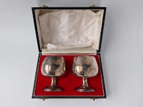 A boxed pair of plain Brandy goblets on spreading bases, 3 1/4" high, Birmingham 1971, 184g