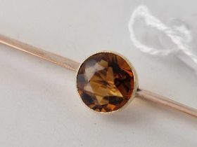 A Edwardian bar brooch set with a citrine 9ct