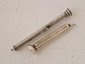 An engine turned cigar piercer and a propelling pencil by S Mordan & Co