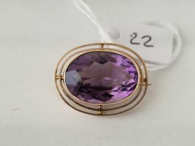 A antique oval amethyst brooch 9ct 28mm x 22mm