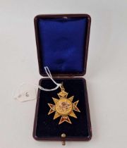 A gold and enamel fob in the form of a cross, 9ct in a box. 9.9 g