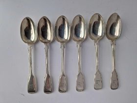 A set of six good fiddle thread crested dessert spoons, London 1864 by GA, 330g