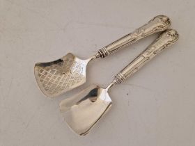 A pair of Georgian Kings Pattern caddy spoons, Birmingham 1933 by TF and the other probably 1830