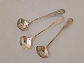 Three 18th Century Irish salt spoons with bright cut decoration