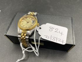 A ladies BULOVA wrist watch with seconds sweep and date aperture