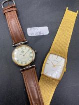 A unisex GIORGIO Beverly hills quart watch together with a accurist wrist watch