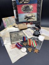 A group of WWII medals (Africa, Italy and 1939/45 Stars plus war medal) in box to A.W Randall