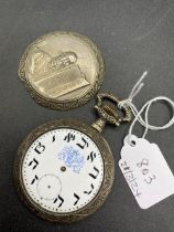 A silver pocket watch with unusual lettering AF