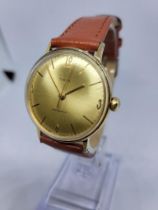 Gents Timex Gold coloured Wrist watch