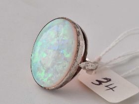 A large silver solitaire opal ring size M 6 gms