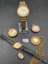 A selection of ladies pendant watches a ladies Timex and one other gents watch all appear W/O