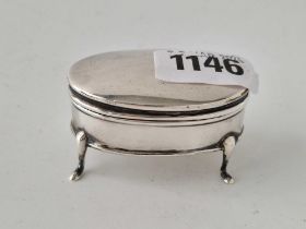 A small oval jewellery box with hinged cover, pad feet, 2.1/4" wide, Birmingham 1911