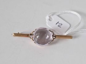 Antique 9ct Gold bar brooch set with a domed rock crystal, 5.1g