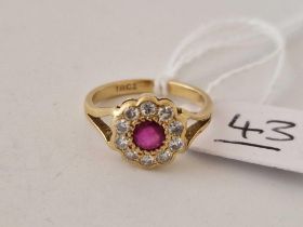 A ruby and diamond cluster ring 18ct gold size I 2.7 g