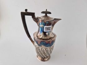 An Edwardian water jug with half fluted body and hinged cover, 9" high, 420g