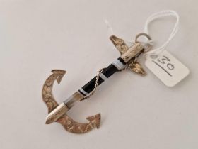 A silver and agate anchor pendant