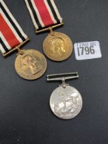 Two special constabulary medals and another