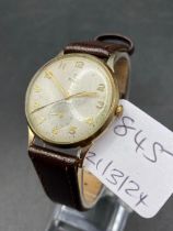 A GOOD GENTS TUDOR WRIST WATCH WITH SECONDS DIAL 9CT WITH LEATHER STRAP