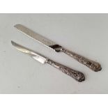 Two silver handled bread and cake knives