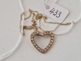 A diamond heart pendant necklace, 15 inch