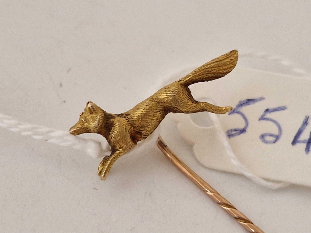 A Victorian fox topped stick pin, 15ct