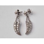 A PAIR OF CLAW SHAPED EARRINGS, SET WITH DIAMONDS, 18ct, 5.9 g.