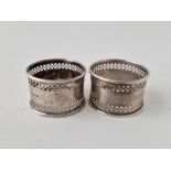 A pair of napkin rings with pierced decoration, Birmingham 1919