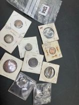 A assorted interesting old coins in packets
