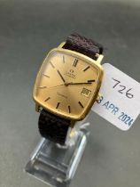 A OMEGA AUTOMATIC DATE JUST GENEVE WRIST WATCH WITH SECONDS SWEEP AND DATE APERTURE W/O